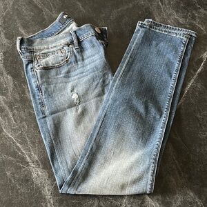 Express Blue Mid Rise Super skinny Jeans with Distressed Details